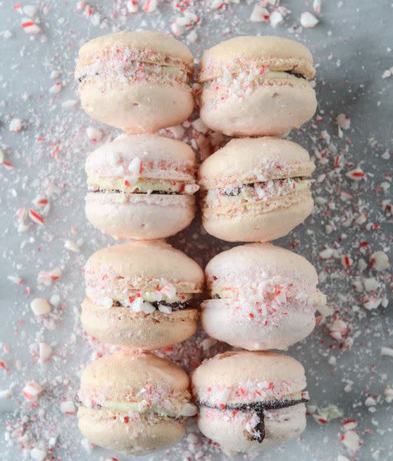 Pink peppermint bark macarons from <a href="http://www.howsweeteats.com/2015/12/pink-peppermint-bark-macarons/" target="_blank">How Sweet It Is</a> (Photo: <a href="http://www.howsweeteats.com/2015/12/pink-peppermint-bark-macarons/" target="_blank">How Sweet It Is</a>)