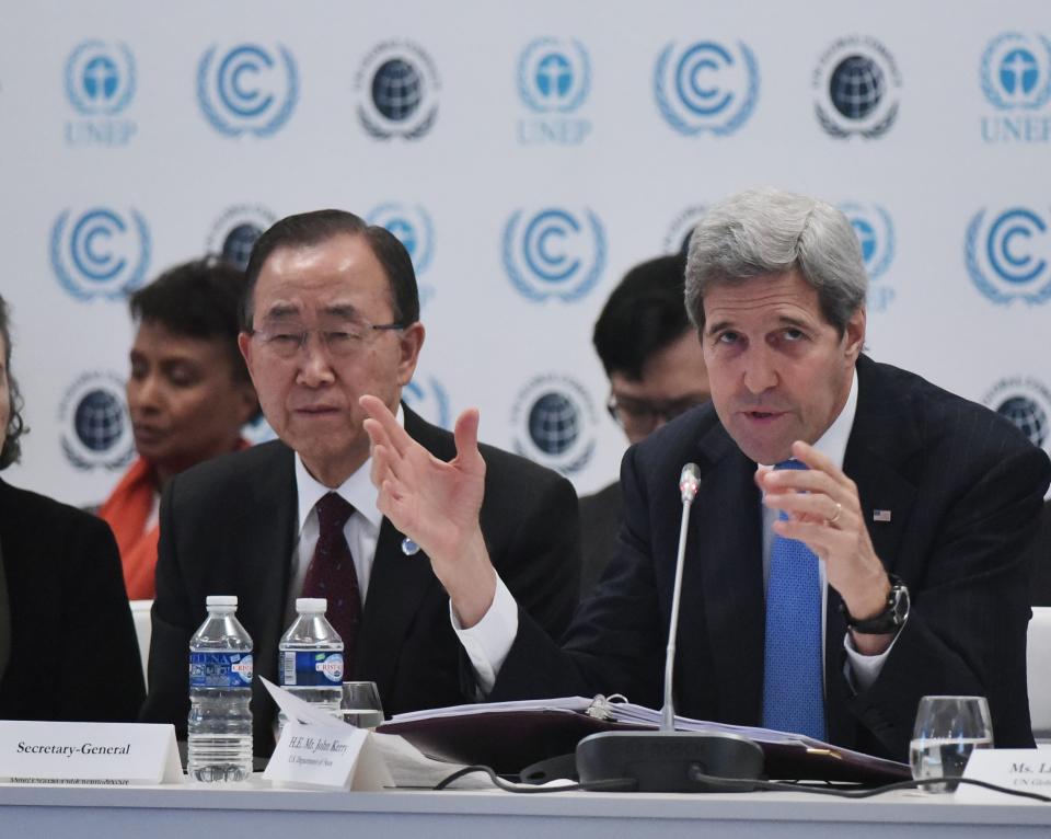 John Kerry (right) has been tapped to be the Biden administration's special envoy for climate. (Mandel Ngan/Pool Photo via AP)