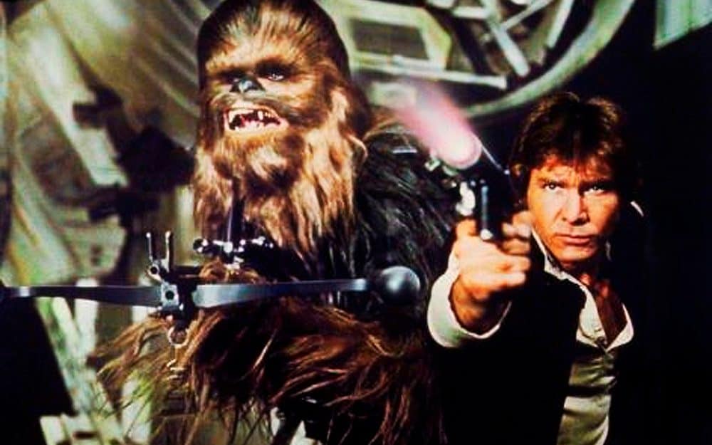 Peter Mayhew as Chewbacca, left, and Harrison Ford as Hans Solo in the original 1977 