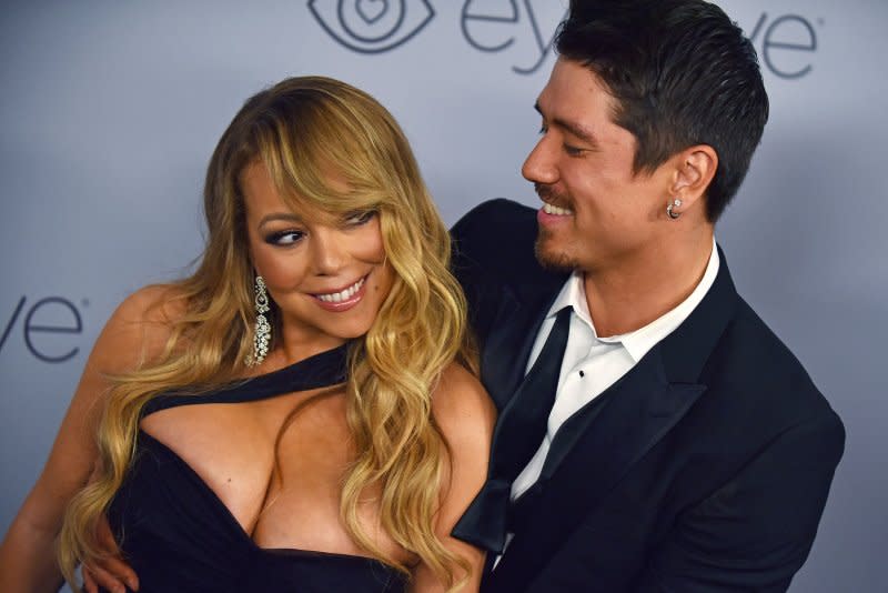 Mariah Carey (L) and Bryan Tanaka have separated after seven years, Tanaka confirmed on Instagram. File Photo by Christine Chew/UPI