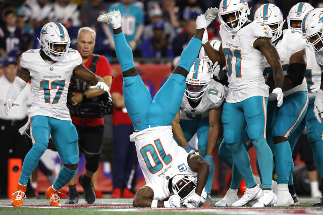 Miami Gardens, Florida, USA. 23rd Sep, 2018. The Miami Dolphins flags are  displayed on the field as a new touchdown is celebrated in the fourth  quarter of a NFL football game between