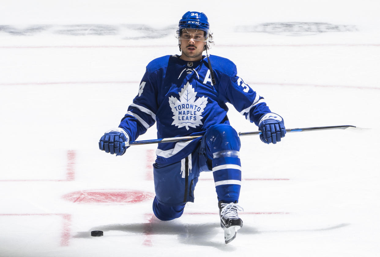 TORONTO, ON - MAY 22: Auston Matthews #34 of the Toronto Maple Leafs stretches during warm up before playing the Montreal Canadiens in Game Two of the First Round of the 2021 Stanley Cup Playoffs at the Scotiabank Arena on May 22, 2021 in Toronto, Ontario, Canada. (Photo by Mark Blinch/NHLI via Getty Images)