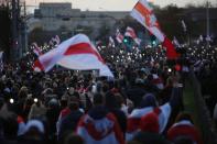 Belarusian opposition supporters hold a rally in Minsk