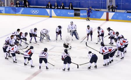 Ice Hockey - Pyeongchang 2018 Winter Olympics - Women’s Classification Match - Sweden v Korea - Kwandong Hockey Centre, Gangneung, South Korea - February 20, 2018 - Korea players stand in a circle after the game. REUTERS/David W Cerny
