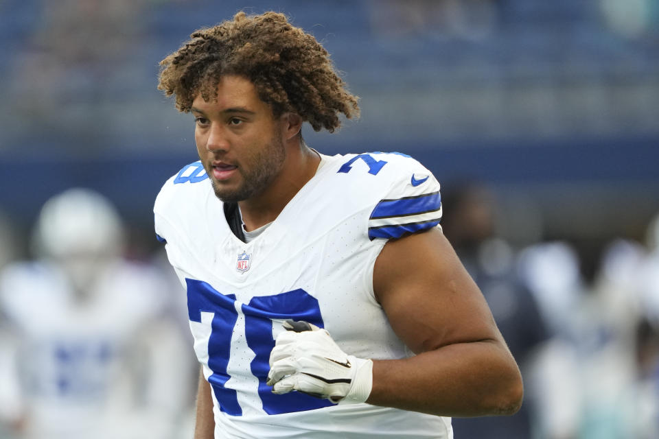 Dallas Cowboys offensive tackle Terence Steele runs before a preseason NFL football game against the Seattle Seahawks, Saturday, Aug. 19, 2023, in Seattle. (AP Photo/Lindsey Wasson)