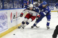 Tampa Bay Lightning defenseman Victor Hedman (77), of Sweden, defends against Columbus Blue Jackets' Stefan Matteau during the first period of an NHL hockey game Thursday, April 22, 2021, in Tampa, Fla. (AP Photo/Mike Carlson)