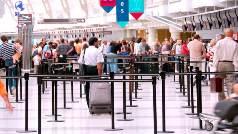 Large check-in line at airport.