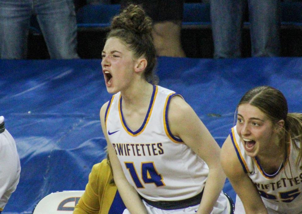Chloe Birkenfeld cheers from the bench during Nazareth's Region I-1A girls basketball championship victory over Claude in the Texan Dome at Levelland on Saturday, Feb. 25, 2023.