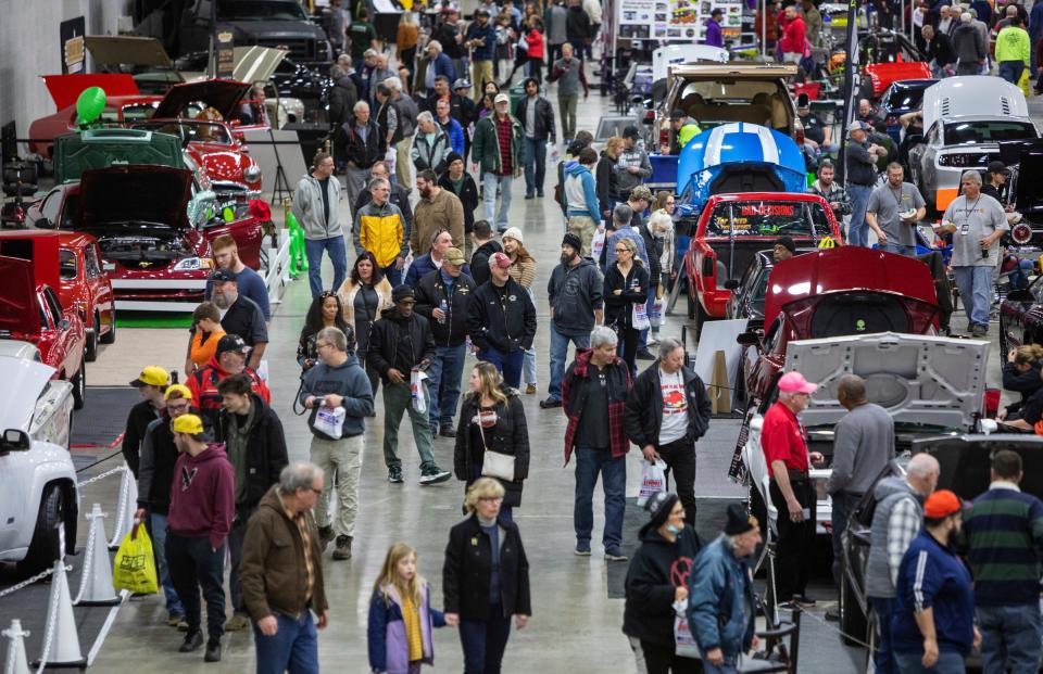 People gather inside Huntington Place for the 70th Annual Meguiar's Detroit Autorama car show in Detroit on Friday, Feb. 24, 2023. The car event features over 800 hot rods, customs, trucks and motorcycles worldwide.