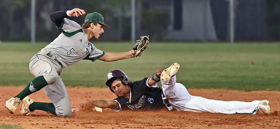 Venice's Marek Houston tags out Riverview's Elijah Hurt after a attempted to steal to second base in the bottom of the third inning. Riverview Rams lost 4-1 as visiting Venice triumphed on Friday night, March 25, 2022, at the Rams field, played at the Suncoast Technical College, in Sarasota.
