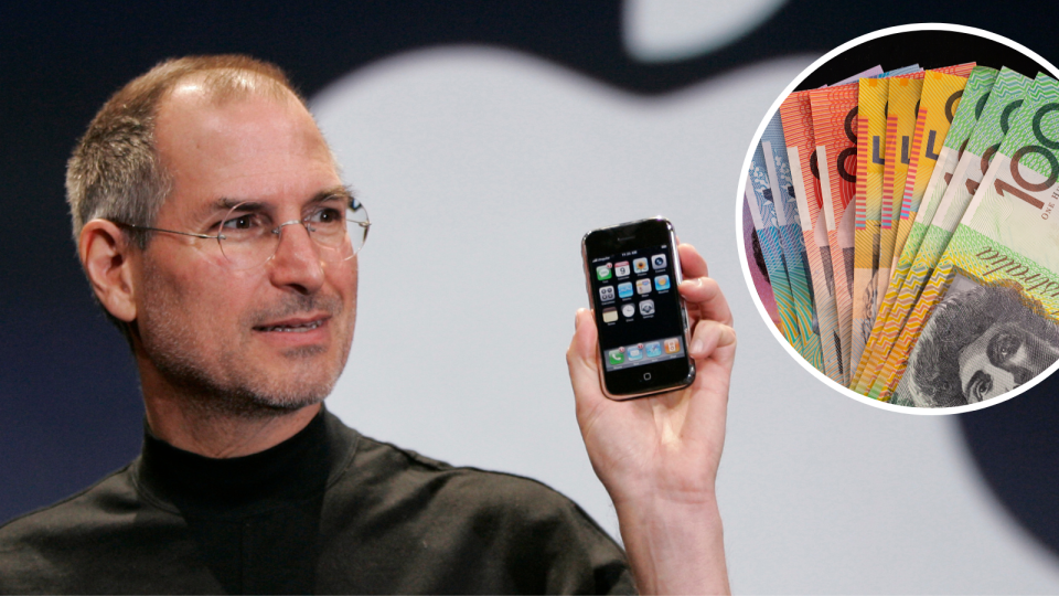 Steve Jobs with first generation iPhone in 2007. Australian money notes.