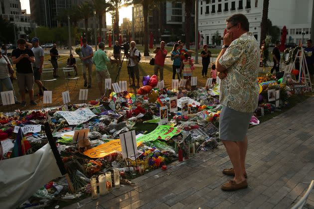 People visit a memorial for those killed at the Pulse nightclub on June 16, 2016, in Orlando, Florida. (Photo: Spencer Platt via Getty Images)