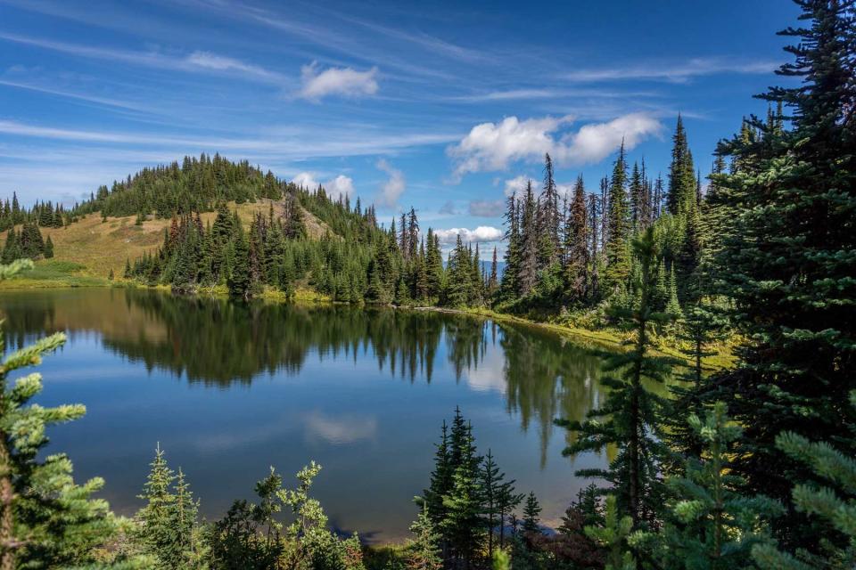 Tod Lake under a beautiful sky on a hike to the summit of Tod Mountain in the Sushwap Highlands of central British Columbia, Canada