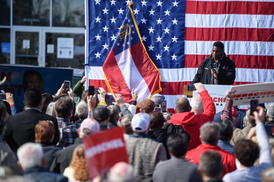 FILE - U.S. Sen. Candidate Herschel Walker, R-Ga., spoke at a campaign stop outside Gerald Jones Honda on Monday, Nov. 14, 2022. It was his first visit to the Augusta area since his runoff with Sen. Raphael Warnock was confirmed in the week prior.