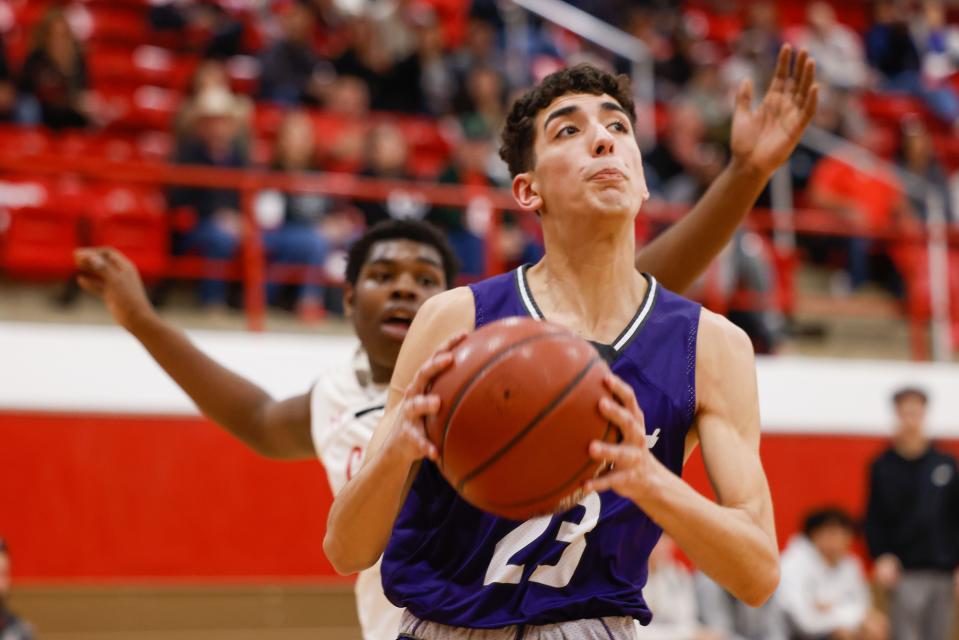 Dimmitt’s CJ Willey (23) goes up for a shot during a high school basketball game against Brownfield on Friday, Jan. 28, 2022, in Brownfield, Texas.