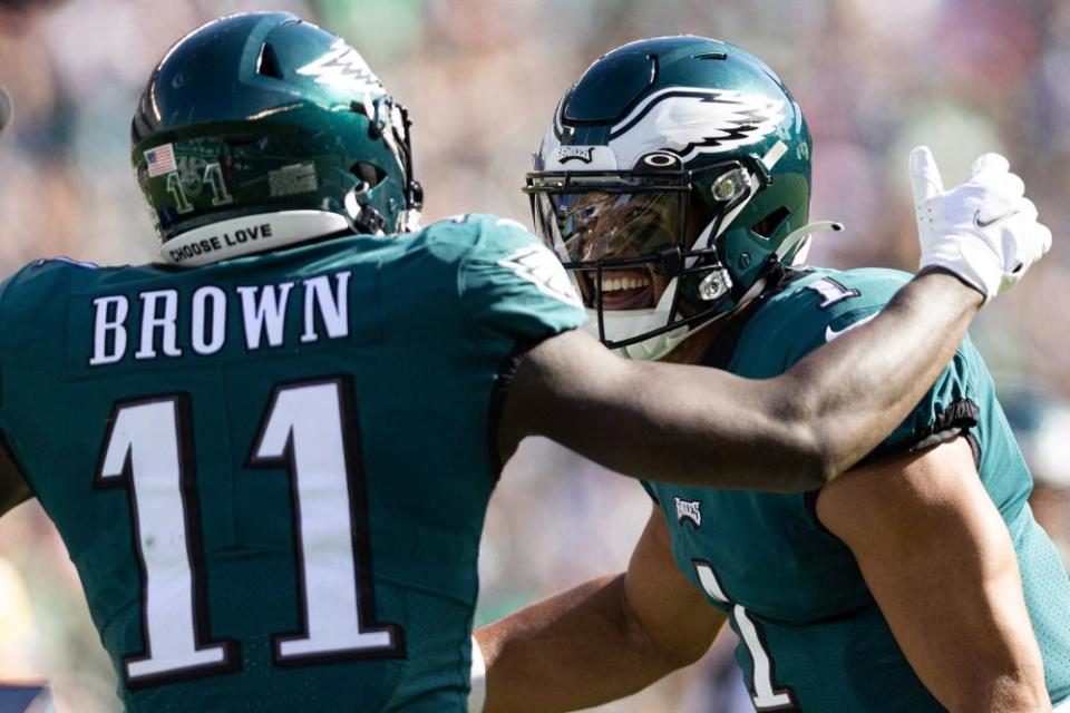 Jalen Hurts celebrates with wide receiver AJ Brown after a touchdown connection against the Steelers.