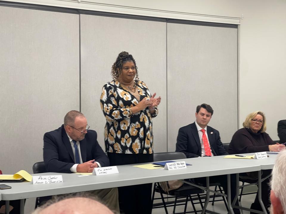 HR Senior Manager for the Virginia Department of Corrections Lucinda Childs-White (center, standing)