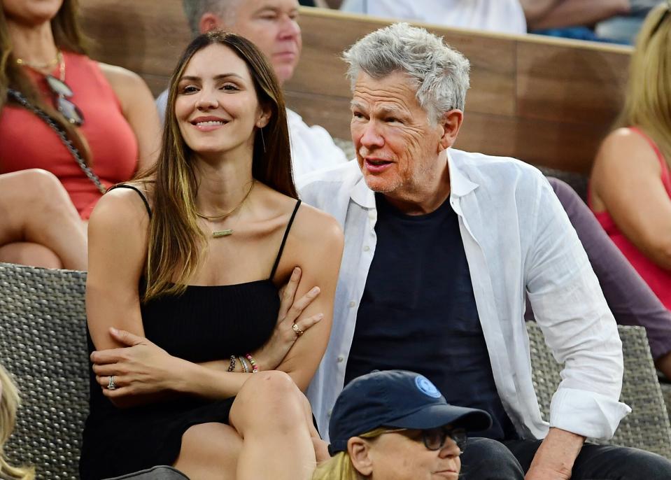 Katharine McPhee with her husband record producer David Foster during a tennis finals match between Nikoloz Basilashvili of Georgia and Cameron Norrie of Great Britain during the BNP Paribas Open played on October 17, 2021 at the Indian Wells Tennis Garden in Indian Wells, CA