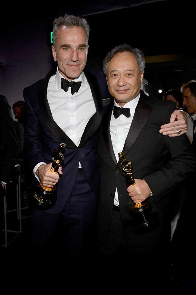 Daniel Day-Lewis holds his trophy for Best Actor for 'Lincoln' and director Ang Lee holds his Best Director trophy for ' Life of Pi' as they attend the Oscars Governors Ball at Hollywood & Highland Center on February 24, 2013 in Hollywood, California.