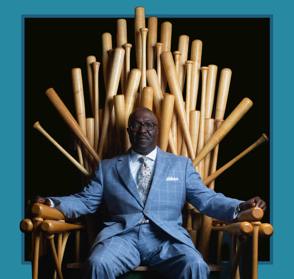 A chair made entirely out of Louisville Slugger baseball bats makes for an ideal throne for Bob Kendrick, president of the Negro Leagues Baseball Museum in Kansas City.