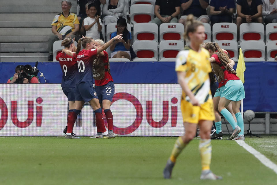 Norway's Isabell Herlovsen, left, celebrates after scoring her side's opening goal during the Women's World Cup round of 16 soccer match between Norway and Australia at the Stade de Nice in Nice, France, Saturday, June 22, 2019. (AP Photo/Thibault Camus)