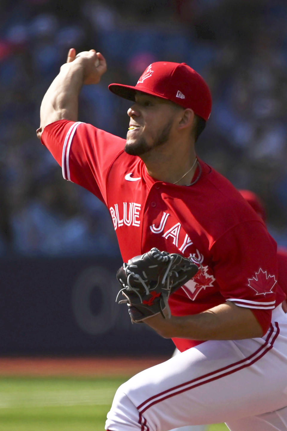 Toronto Blue Jays' starting pitcher Jose Berrios throws to a Baltimore Orioles batter in first inning of a baseball game in Toronto, Saturday, Sept. 17, 2022. (Jon Blacker/The Canadian Press via AP)