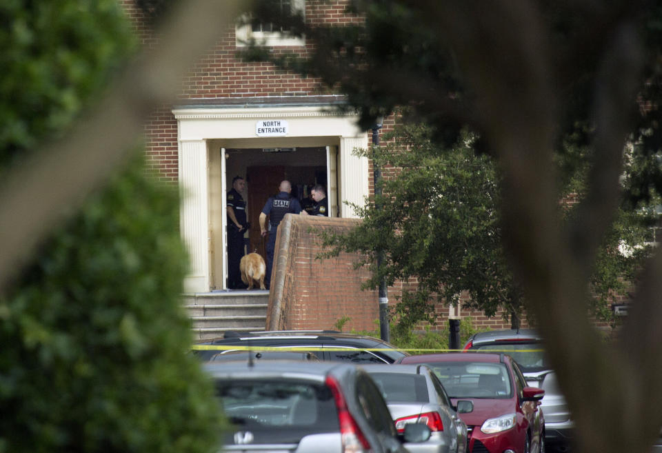 Police work the scene where eleven people were killed during a mass shooting at the Virginia Beach city public works building, May 31, 2019 in Virginia Beach, Va. (Photo: L. Todd Spencer/The Virginian-Pilot via AP)