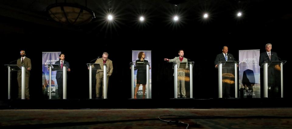 Seven mayoral candidates fielded questions during the Akron Decides: Debating the Future mayoral debate Wednesday at Quaker Station.