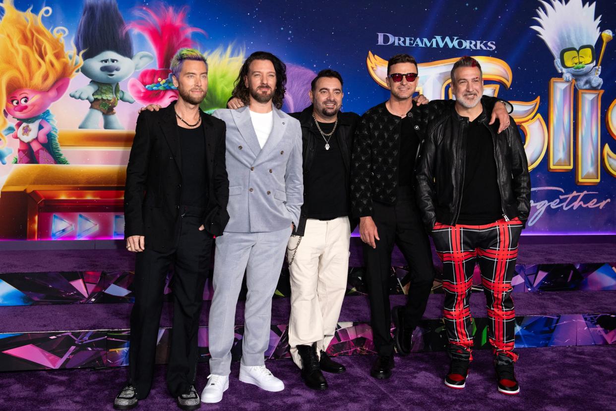 From left: Lance Bass, JC Chasez, Chris Kirkpatrick, Justin Timberlake and Joey Fatone of NSync arrive for the premiere of Trolls Band Together.