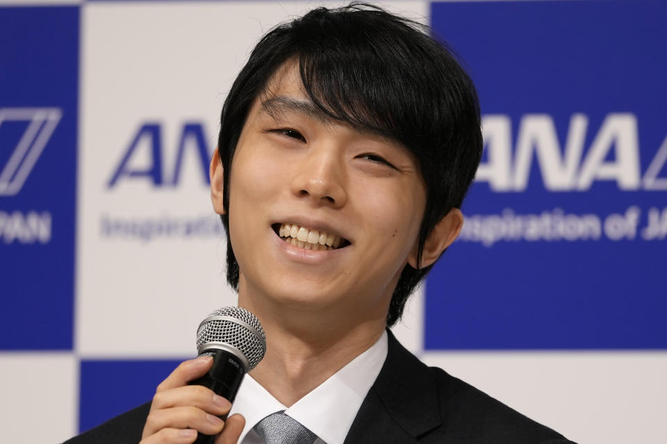 Two-time Olympic champion Yuzuru Hanyu of Japan, speaks during a press conference in Tokyo, Tuesday, July 19, 2022. Hanyu is stepping away from competitive figure skating, he said Tuesday. (AP Photo/Shuji Kajiyama)