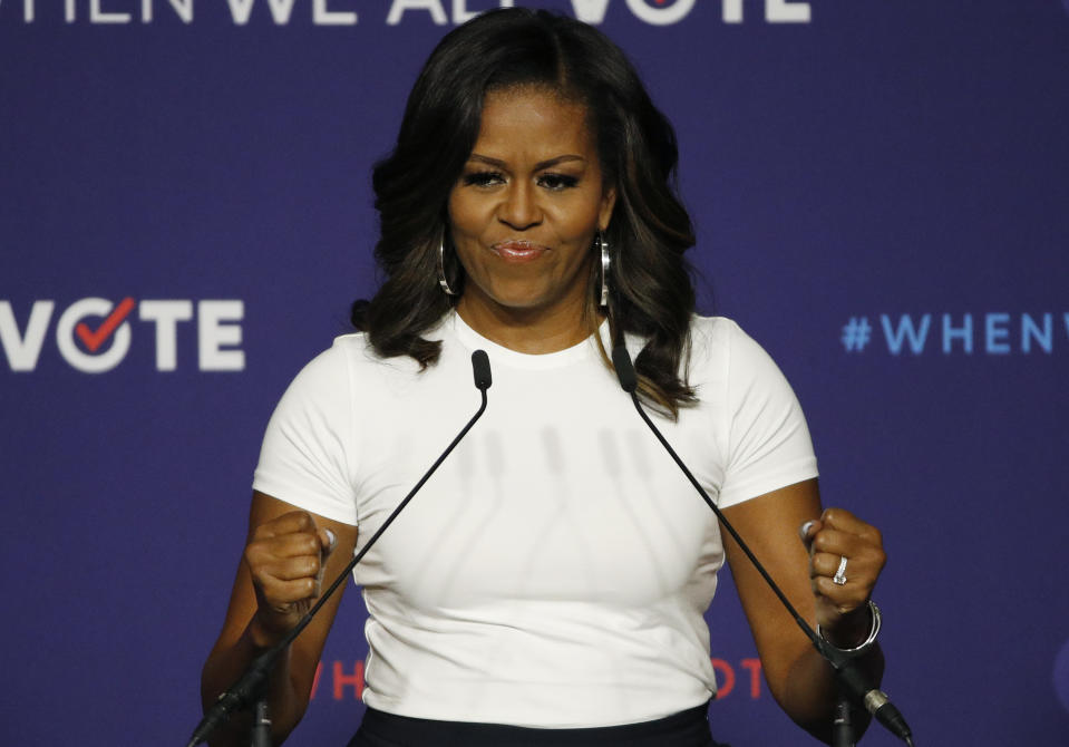 Former first lady Michelle Obama speaks at a rally to encourage voter registration, Sunday, Sept. 23, 2018, in Las Vegas. (AP Photo/John Locher)