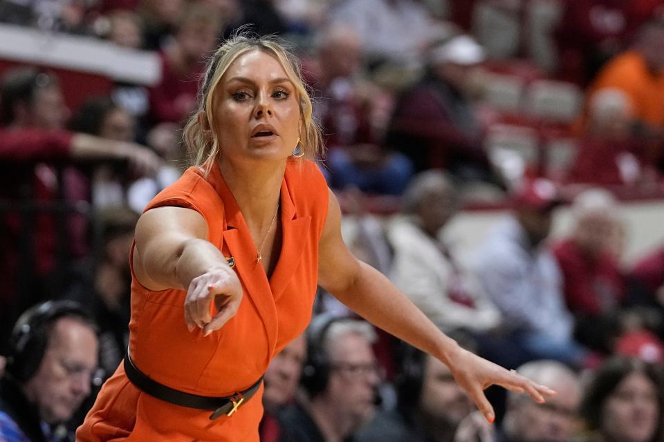 Oklahoma State head coach Jacie Hoyt watches during the first half of a first-round college basketball game against Miami in the women's NCAA Tournament Saturday, March 18, 2023, in Bloomington, Ind.