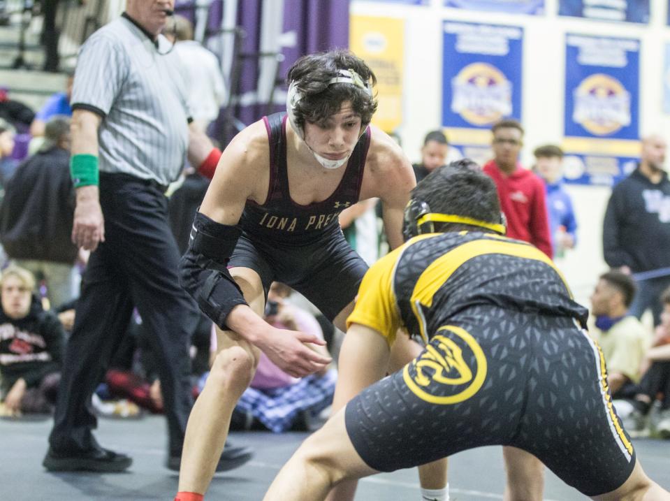 Iona Prep's Justin Shay wrestles in the 132-pound finals of the Murphy-Guccione Shoreline Classic wrestling tournament at New Rochelle High School on Saturday, Jan. 7, 2023.