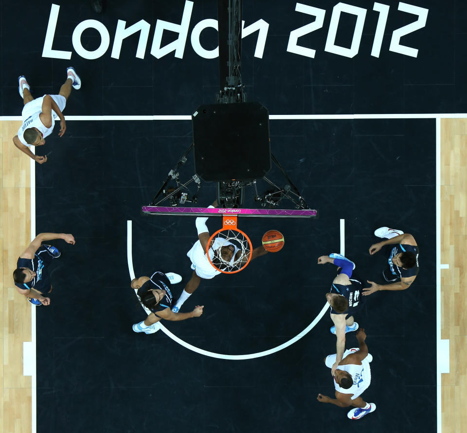 LONDON, ENGLAND - JULY 31: Ronny Turiaf #14 of France puts up a shot in the Men's Basketball Preliminary Round match between France and Argentina on Day 4 of the London 2012 Olympic Games at Basketball Arena on July 31, 2012 in London, England. (Photo by Ian Walton/Getty Images)