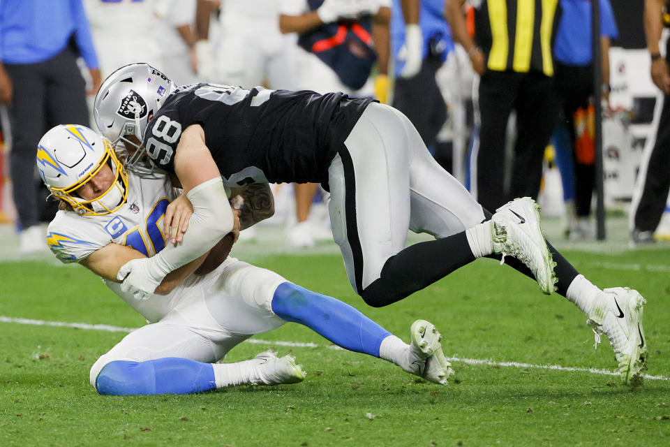 Maxx Crosby of the Las Vegas Raiders sacks Justin Herbert during the Raiders&#39; win. (Photo by Ethan Miller/Getty Images)