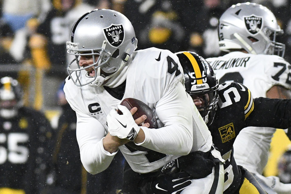 Pittsburgh Steelers linebacker Alex Highsmith (56) sacks Las Vegas Raiders quarterback Derek Carr (4) during the second half of an NFL football game in Pittsburgh, Saturday, Dec. 24, 2022. (AP Photo/Don Wright)