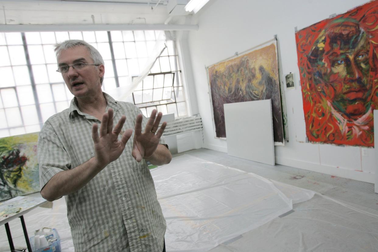 Artist Andrzej Sikora speaks of his art work in his studio at The Russell Industrial Center in Detroit, June 19, 2008.