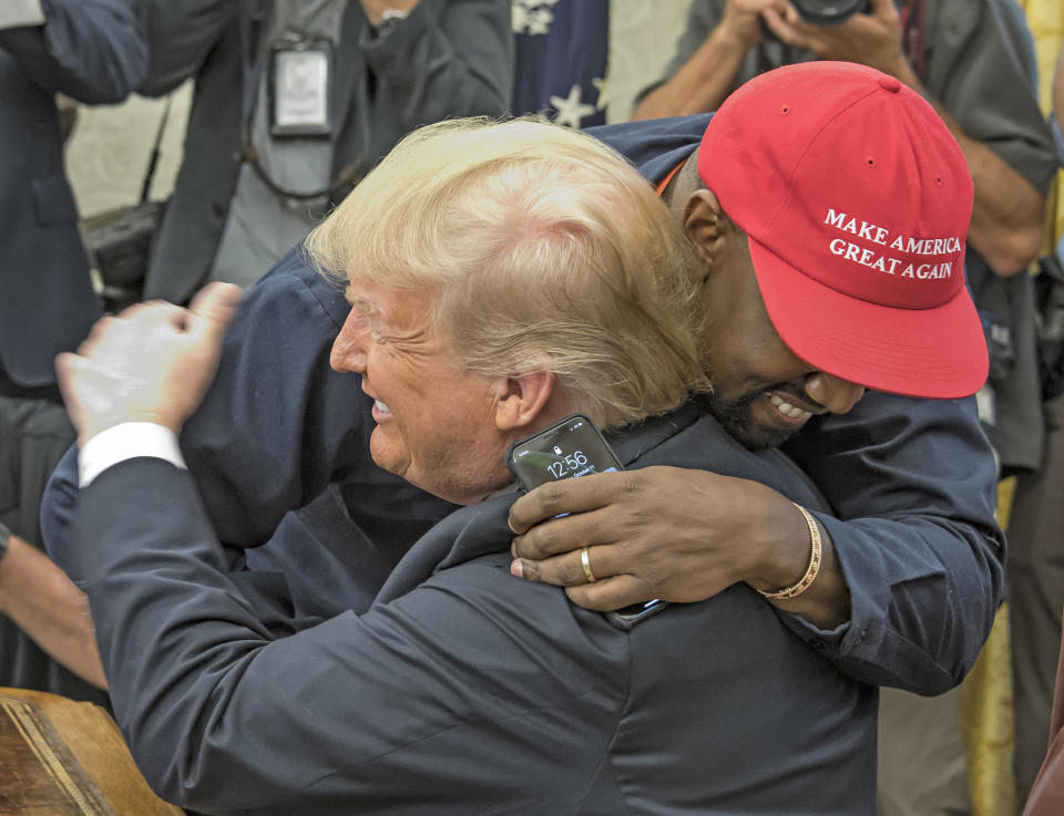 kanye west embracing trump in white house