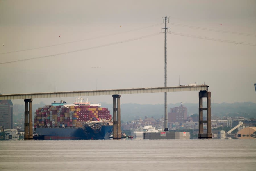 Tugboats escort the container ship Dali after it was refloated in Baltimore, Monday, May 20, 2024. The container ship that caused the deadly collapse of Baltimore’s Francis Scott Key Bridge was refloated Monday and has begun slowly moving back to port. (AP Photo/Matt Rourke)