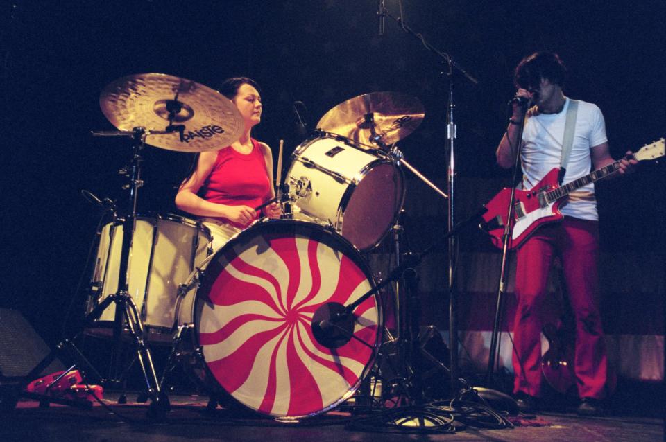 Meg White, left, and Jack White perform in May 2002 at the Royal Oak Music Theatre.