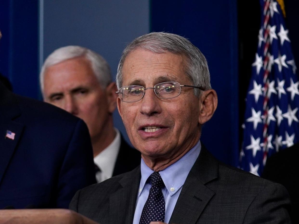 President Donald Trump listens as Director of the National Institute of Allergy and Infectious Diseases Dr. Anthony Fauci speaks during a coronavirus task force briefing at the White House, Friday, March 20, 2020, in Washington. (AP Photo/Evan Vucci)