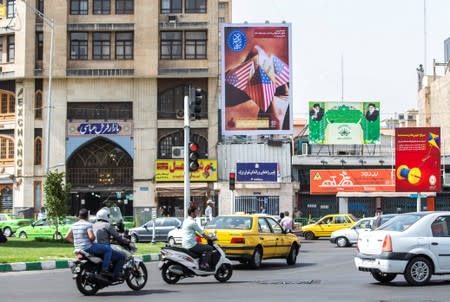 A general view of Ferdowsi Square showing an anti-U.S. mural in Tehran