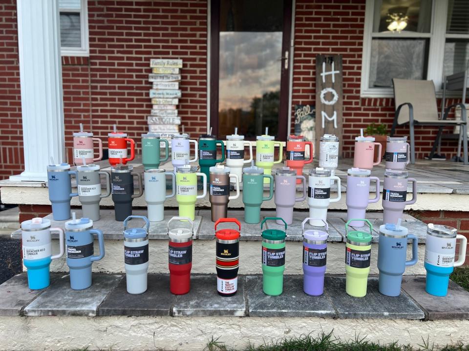 Some of Ashley Kosko's collection of Stanley cups.