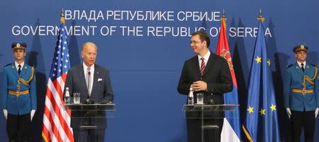 U.S. Vice President Joe Biden (L) and Serbia`s Prime Minister Aleksandar Vucic attend a news conference in Belgrade, Serbia, August 16, 2016. REUTERS/Djordje Kojadinovic