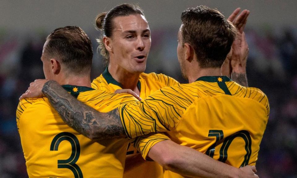 Adam Taggart celebrates his winner with Socceroos teammates