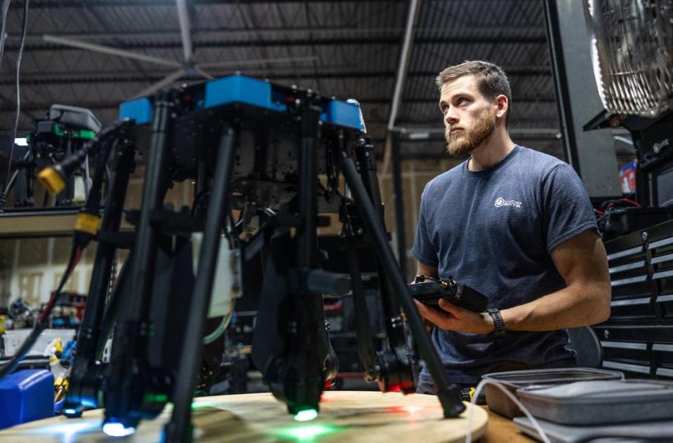 Quentin Shario works on a Sherpa Drone Tuesday, July 24, 2024, at Lucid Bots manufacturing facility in Charlotte.