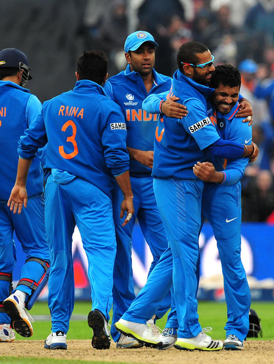 India's Ravindra Jadeja celebrates with Shikhar Dhawan after taking the wicket of Ian Bell during the ICC Champions Trophy Final at Edgbaston, Birmingham.