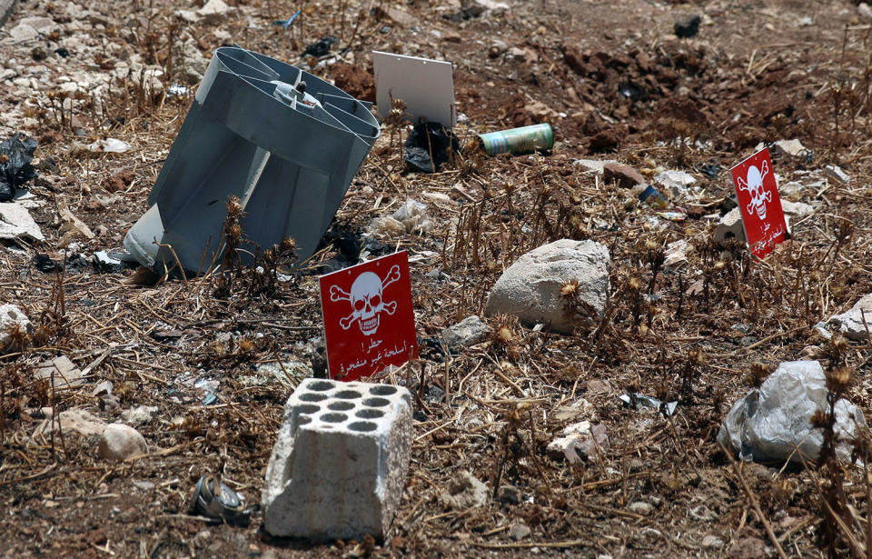 The remains of cluster munitions container