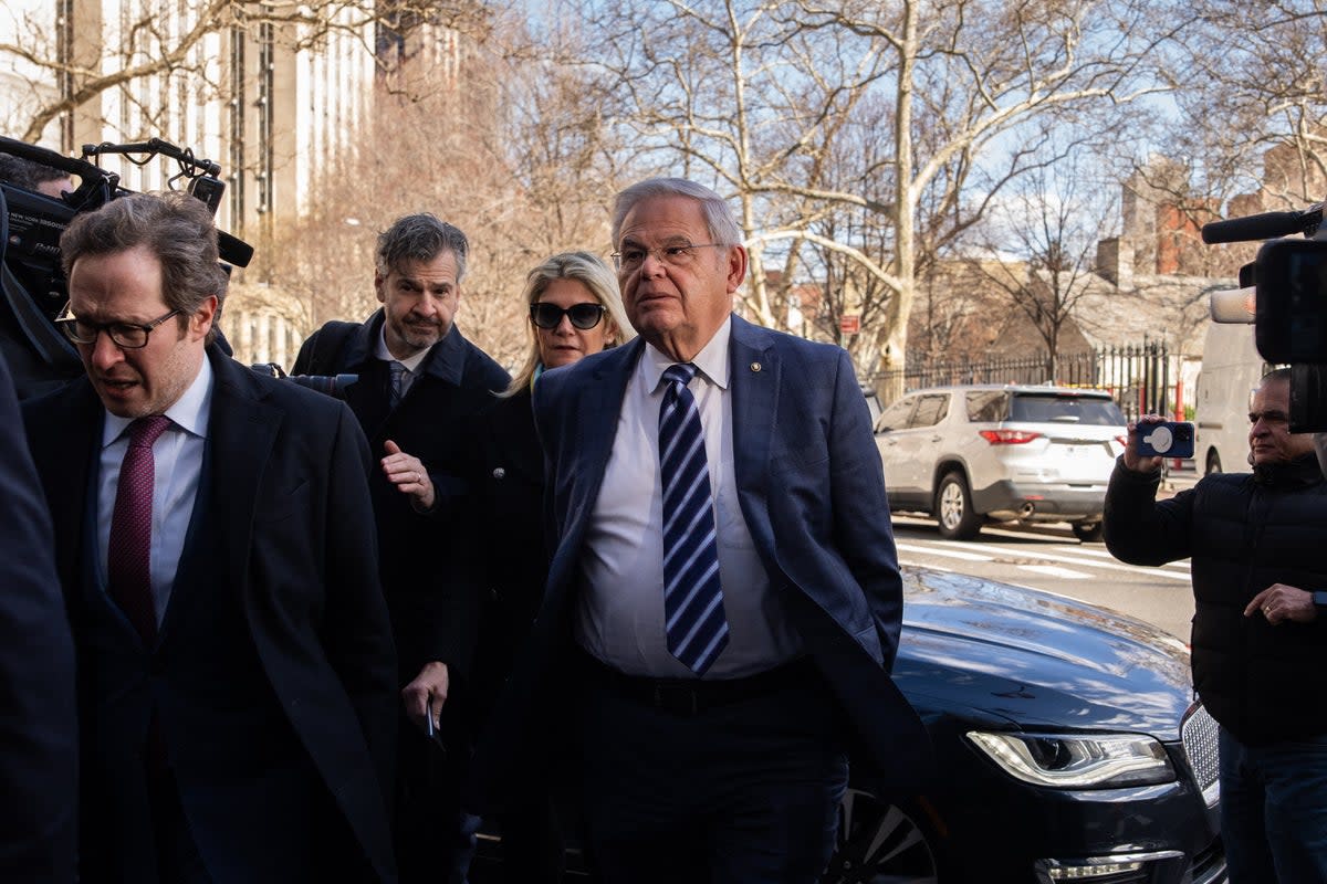 US Senator Bob Menendez arrives with his wife Nadine Menendez for their arraignment (AFP via Getty Images)