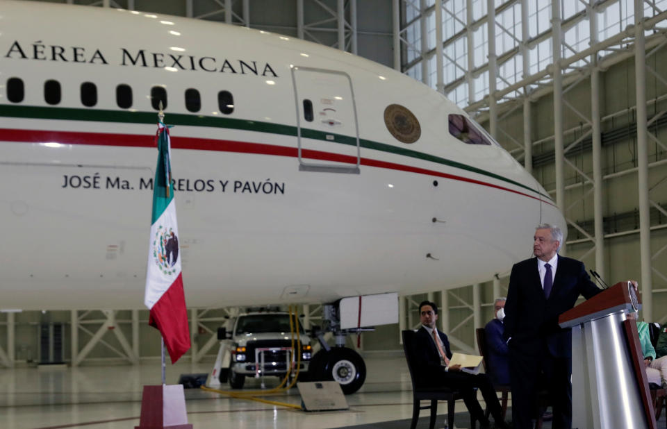 Mexico's President Andres Manuel Lopez Obrador holds a news conference at the presidential hangar, with the presidential plane in the background, at Benito Juarez International Airport in Mexico City, Mexico July 27, 2020. REUTERS/Henry Romero